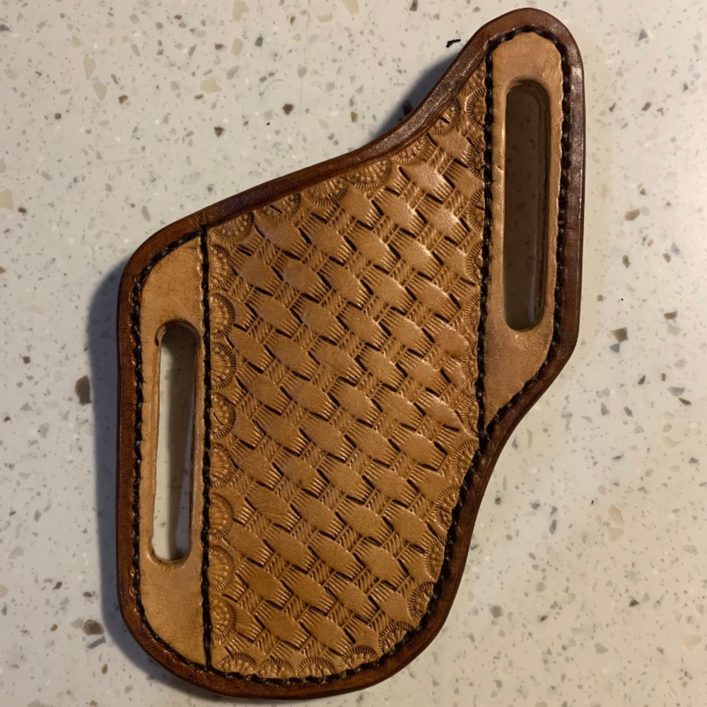 Hand tooled leather knife sheath
